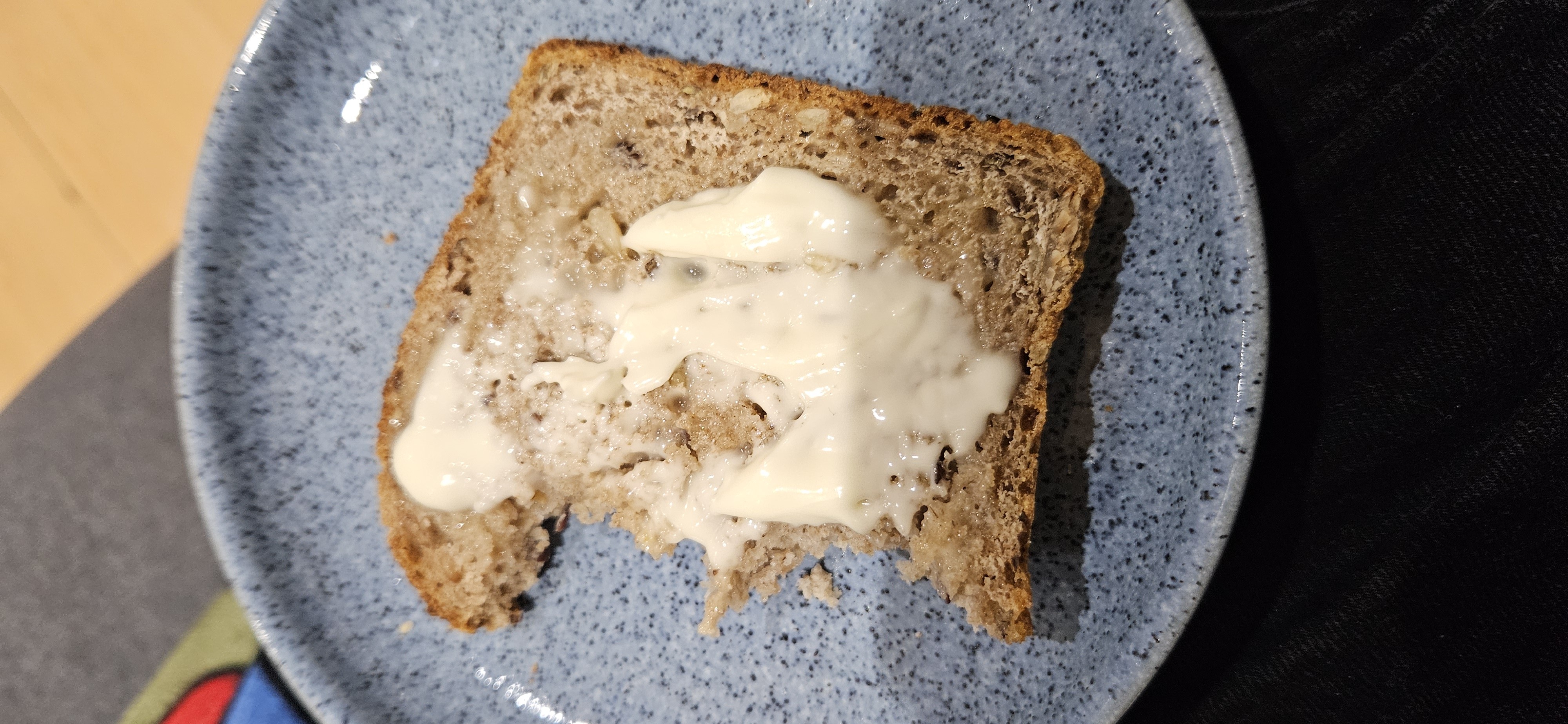 Butter on whole grain bread