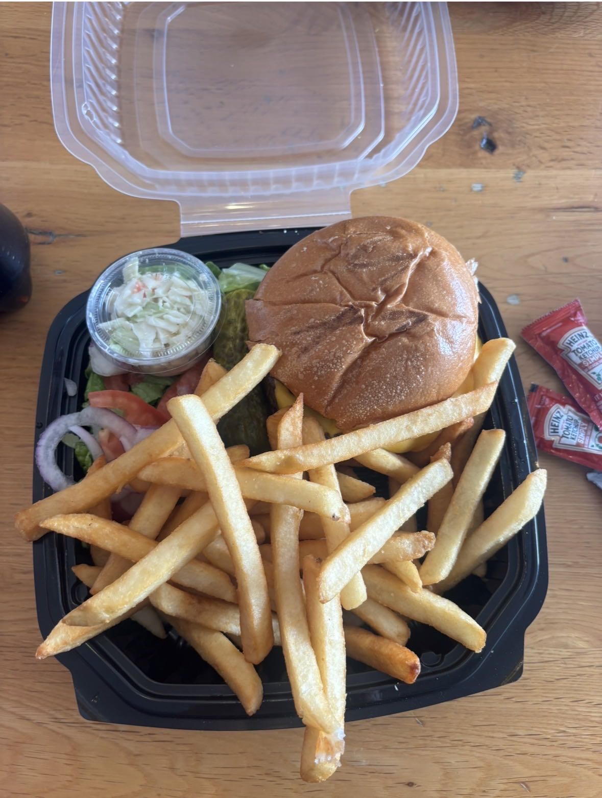 Burger with fries and slaw