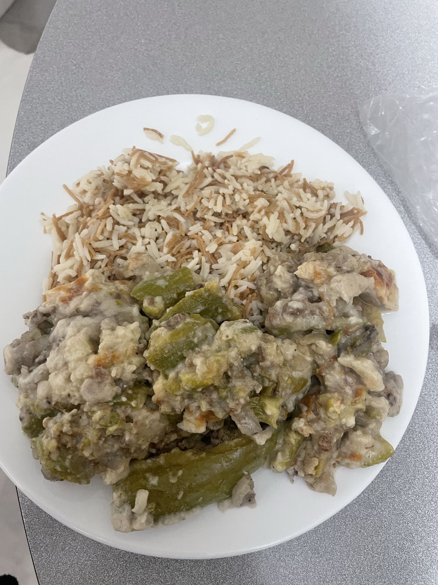 Rice with stuffed zucchini