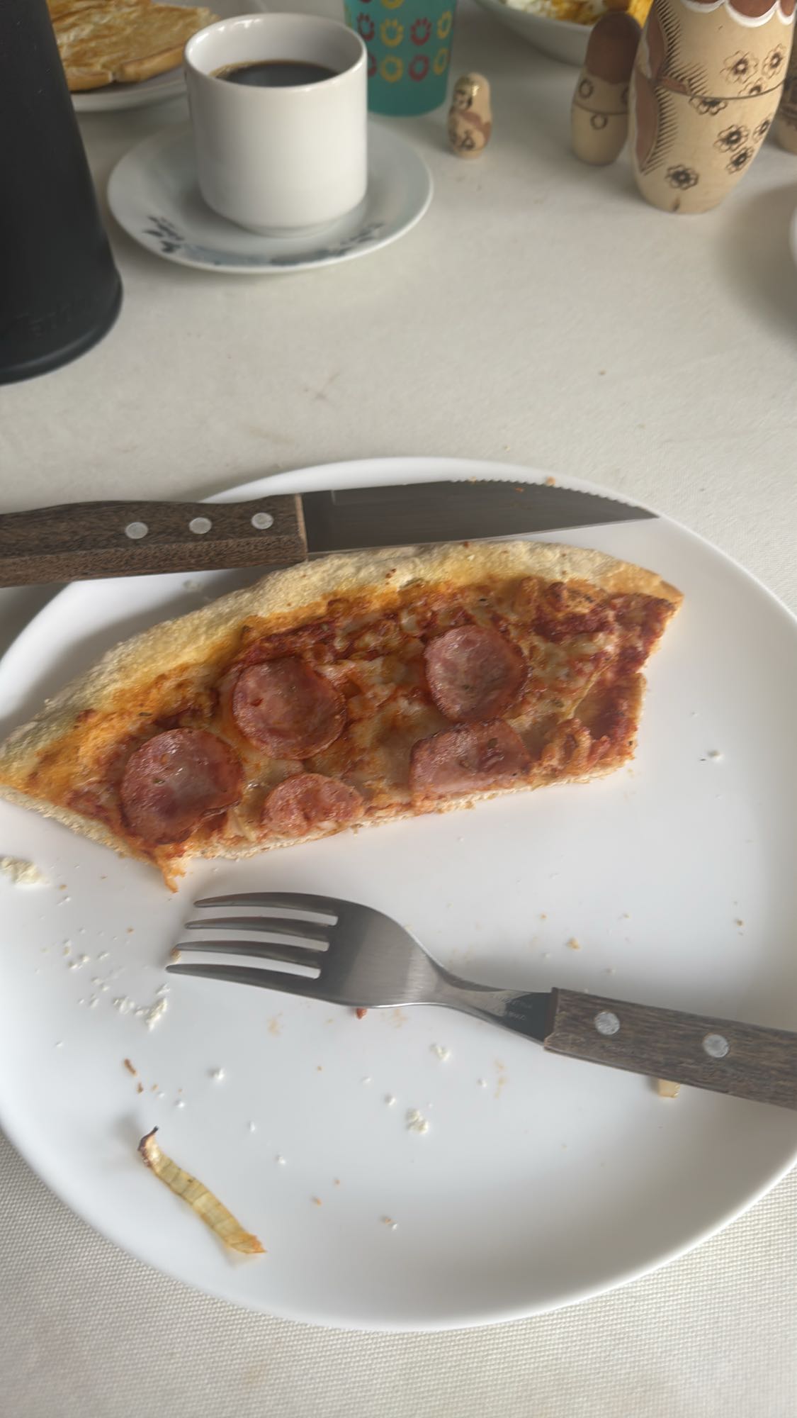 Fatia de pizza de calabresa