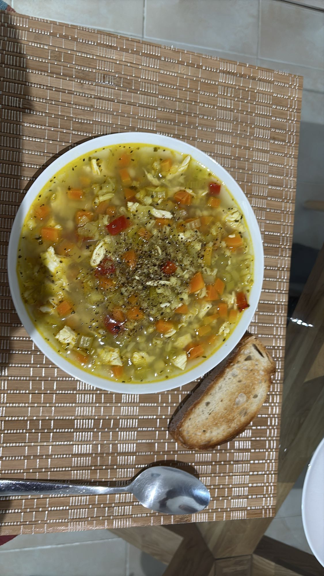 Chicken vegetable soup with bread