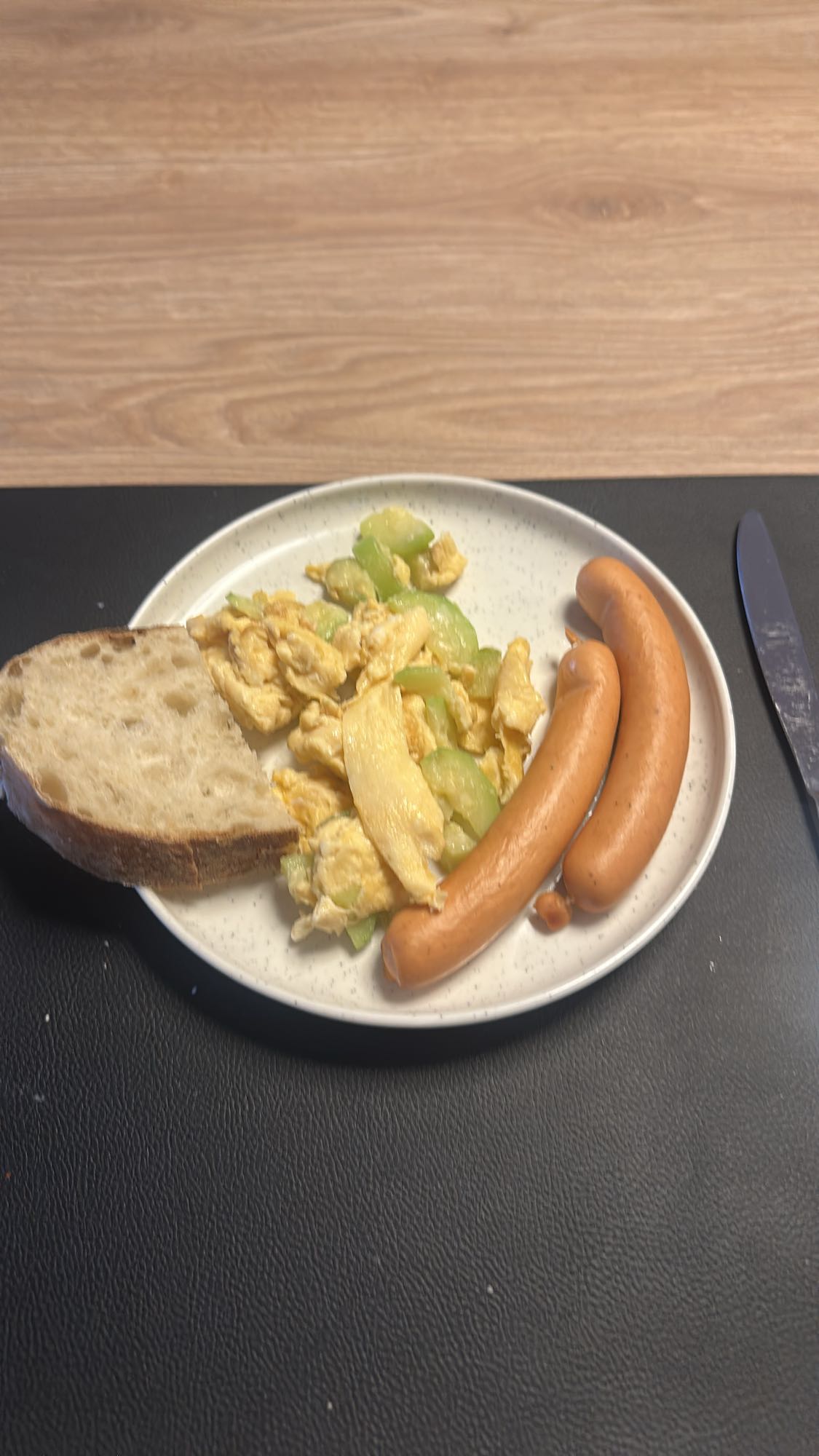 Eggs, sausage, bread plate