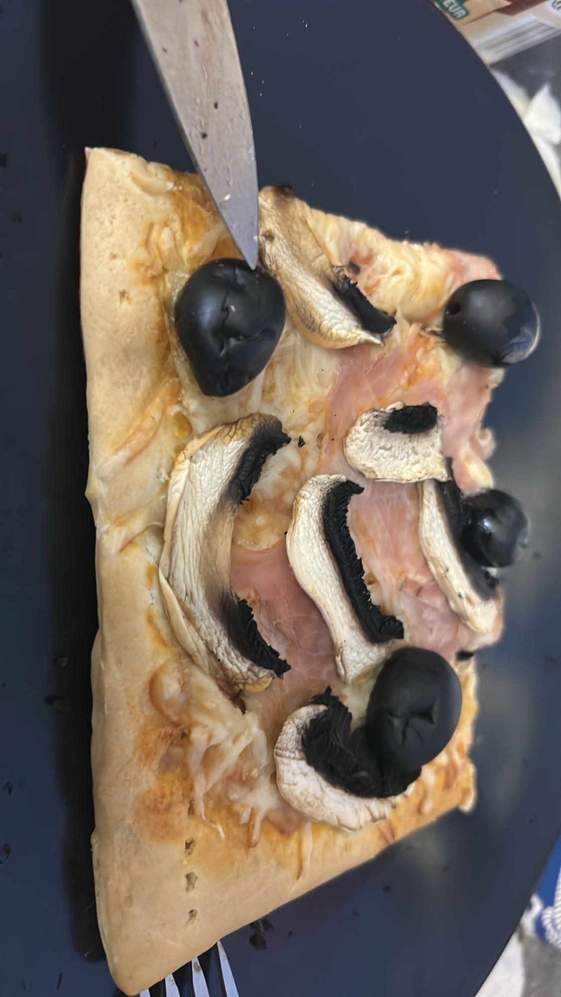 Part de pizza jambon champignons