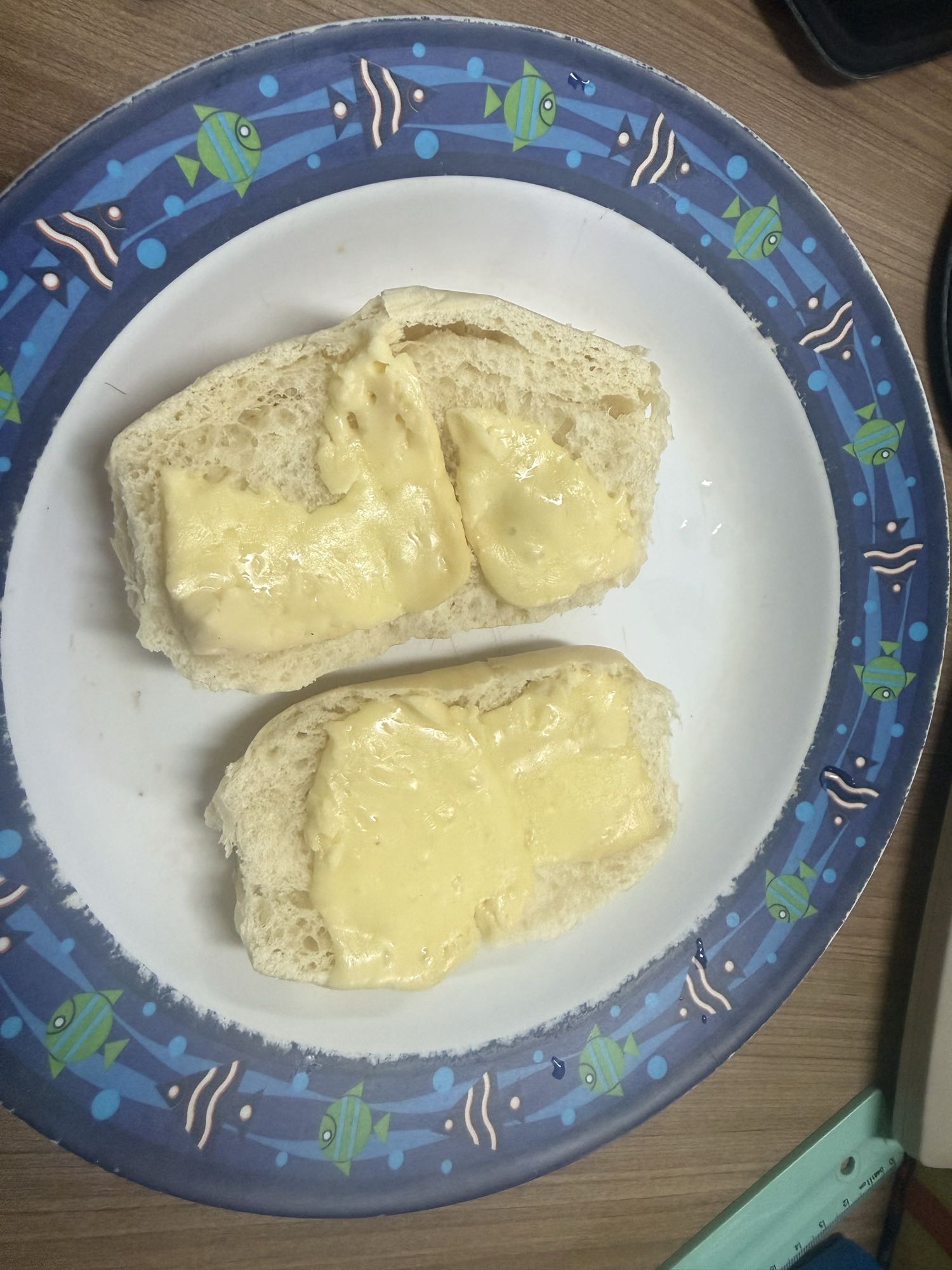 Pão com queijo derretido