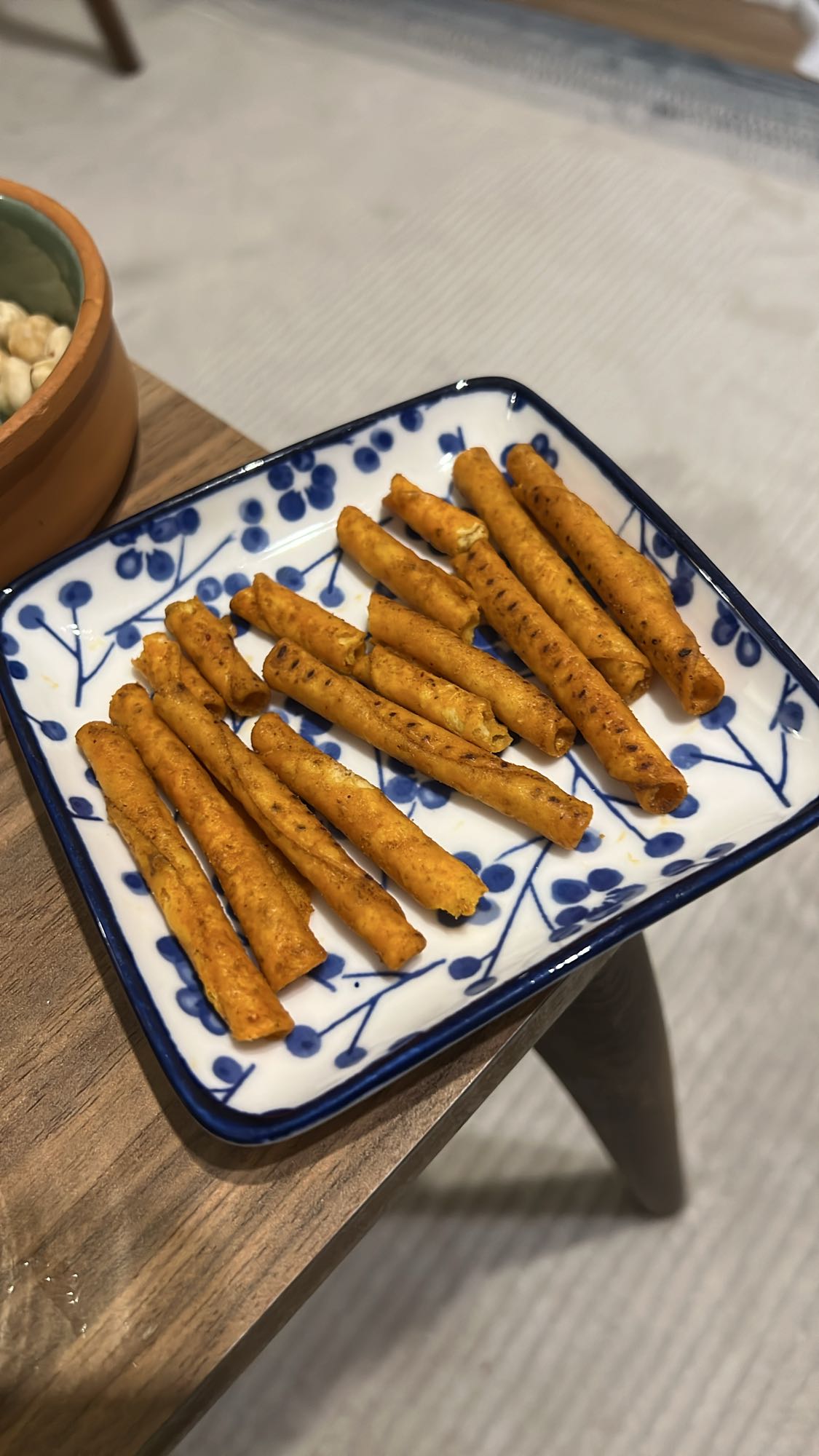 Spicy rolled snack sticks