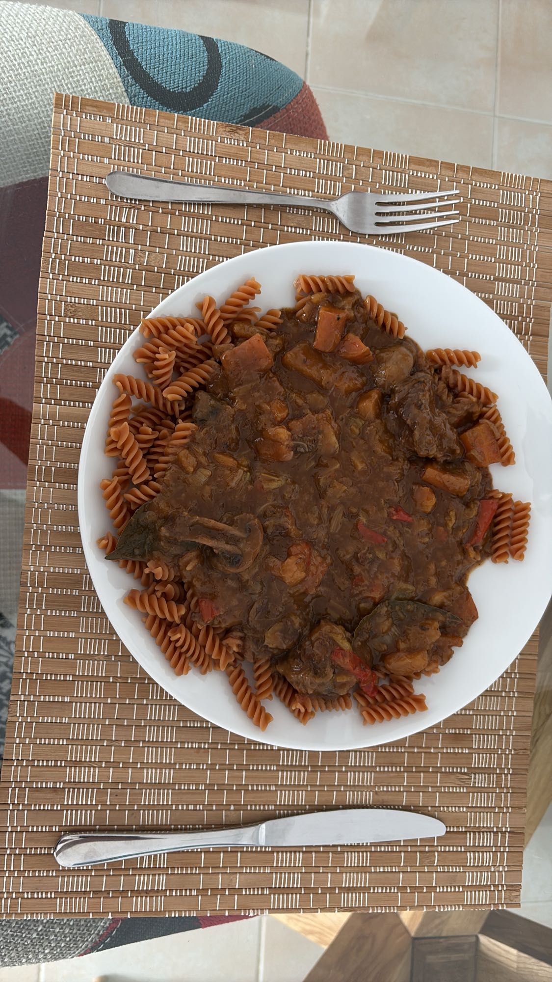 Beef stew with red lentil pasta