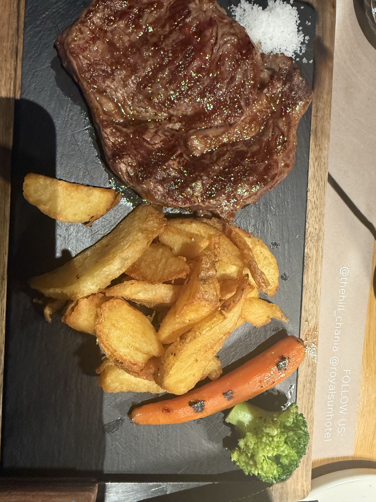 Steak with fries and veggies