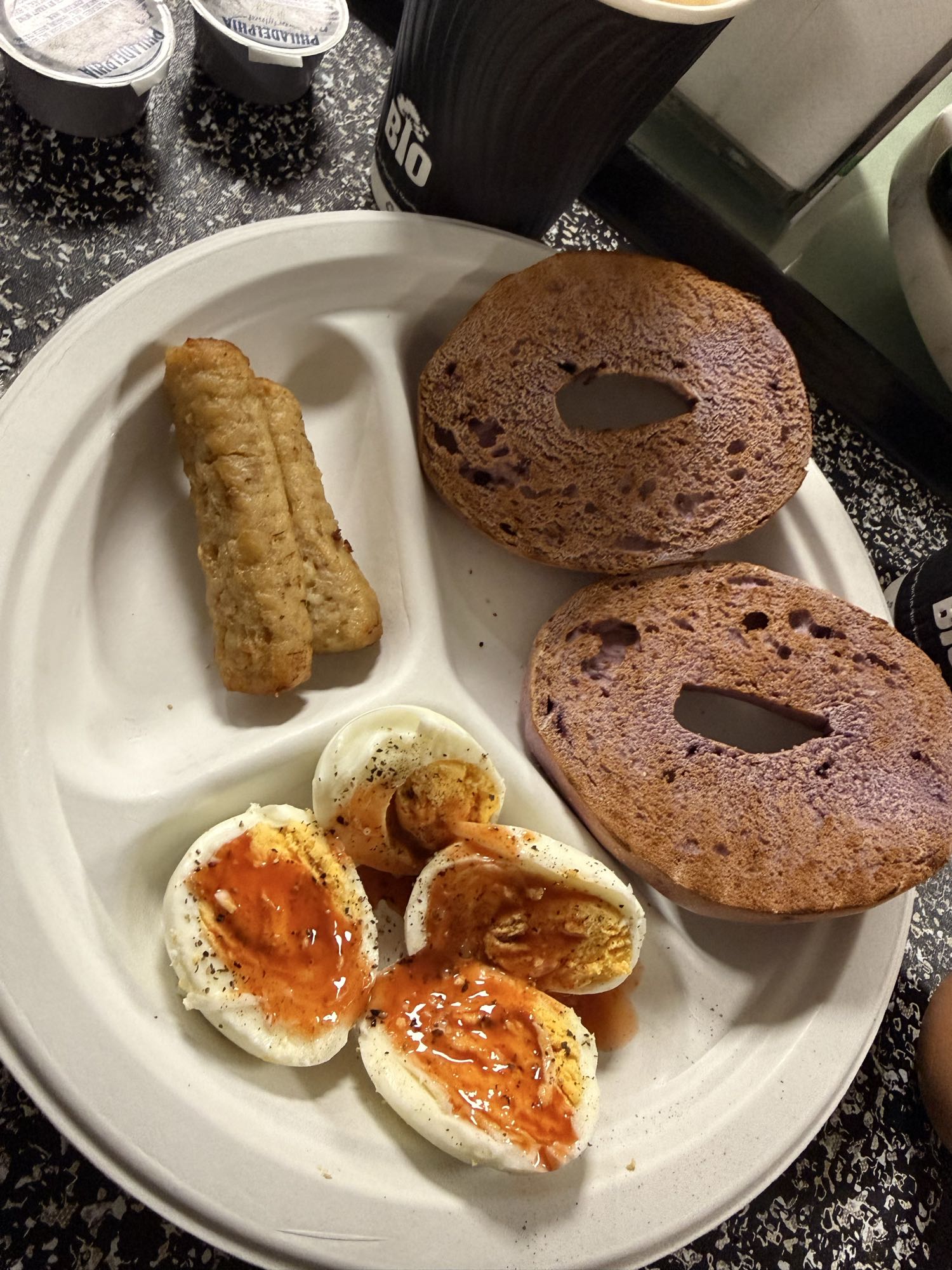 Eggs, bagel, sausage breakfast