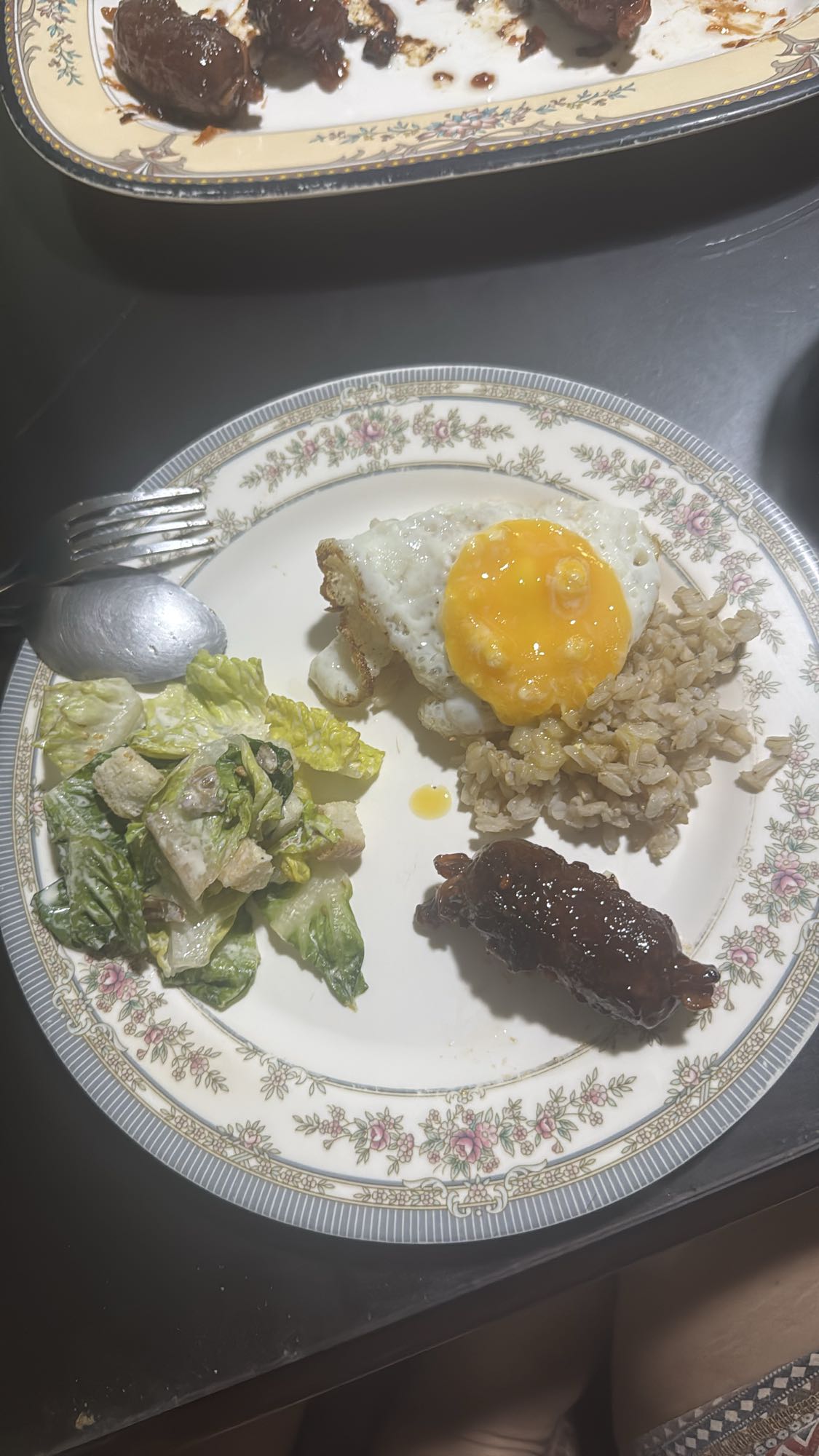 Egg, rice, salad, beef roll