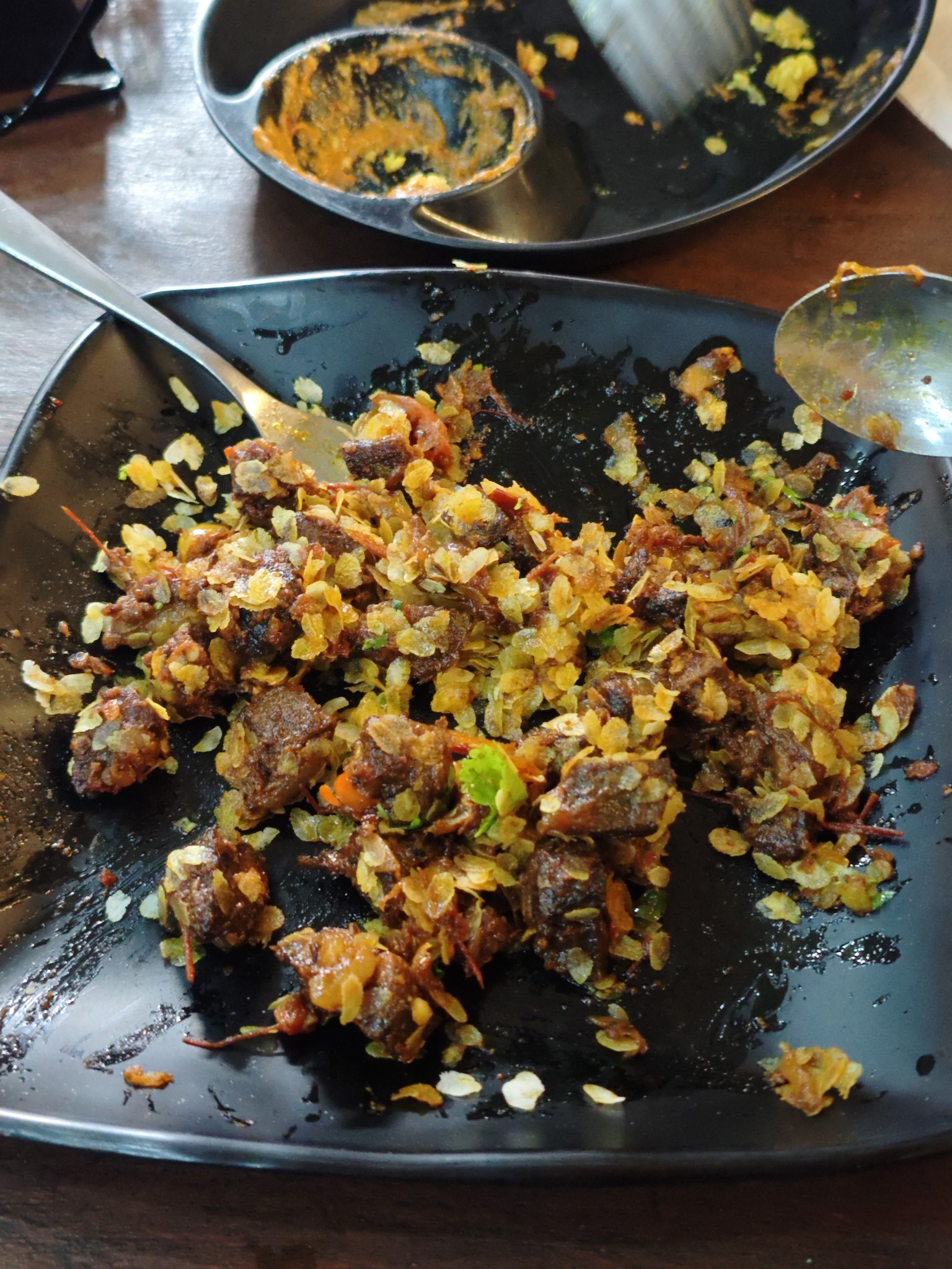 Fried beef with poha