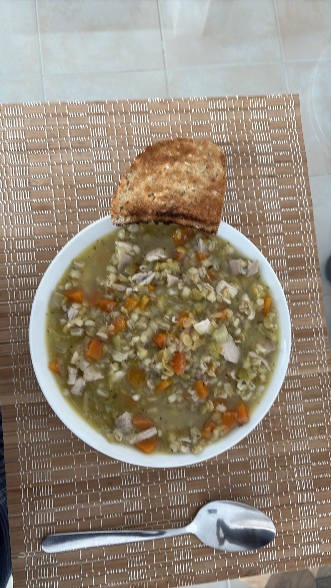 Chicken barley soup with toast