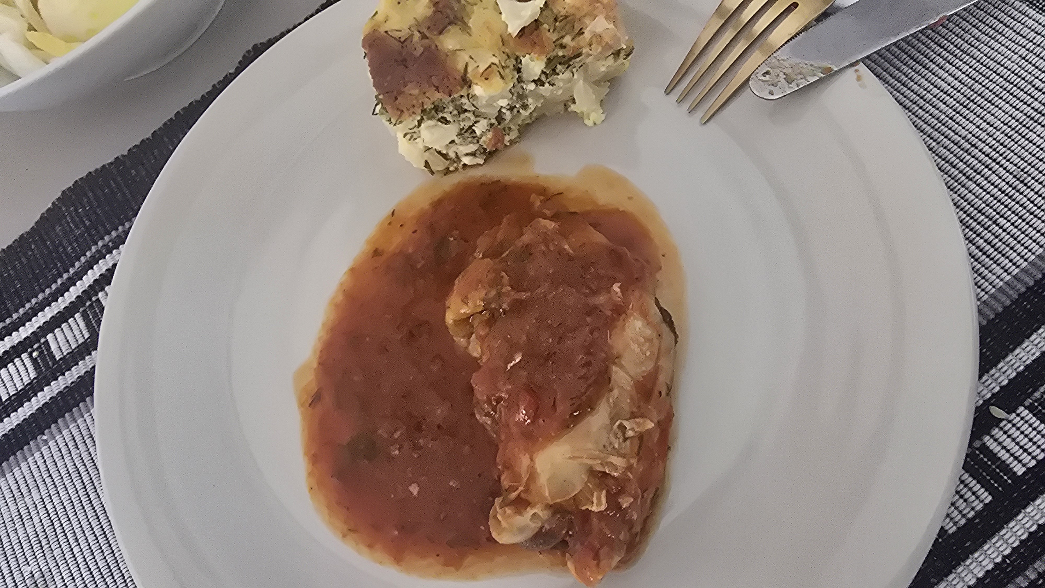 Chicken with tomato sauce and egg casserole