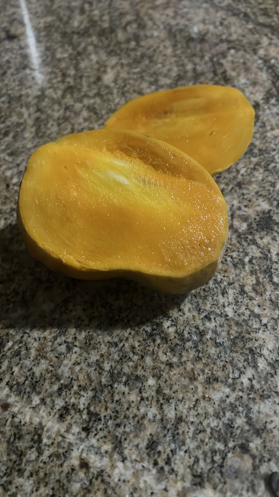 Fresh mango halves