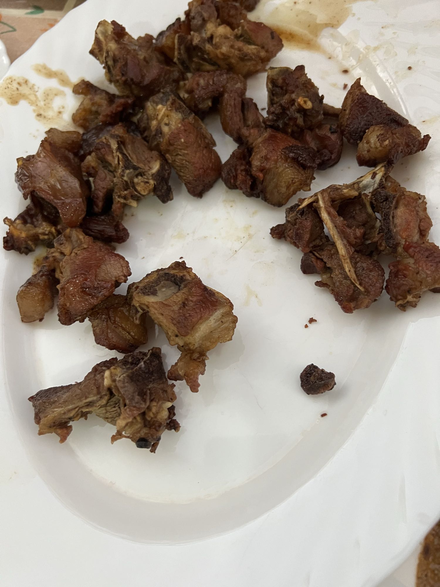 Fried goat meat pieces