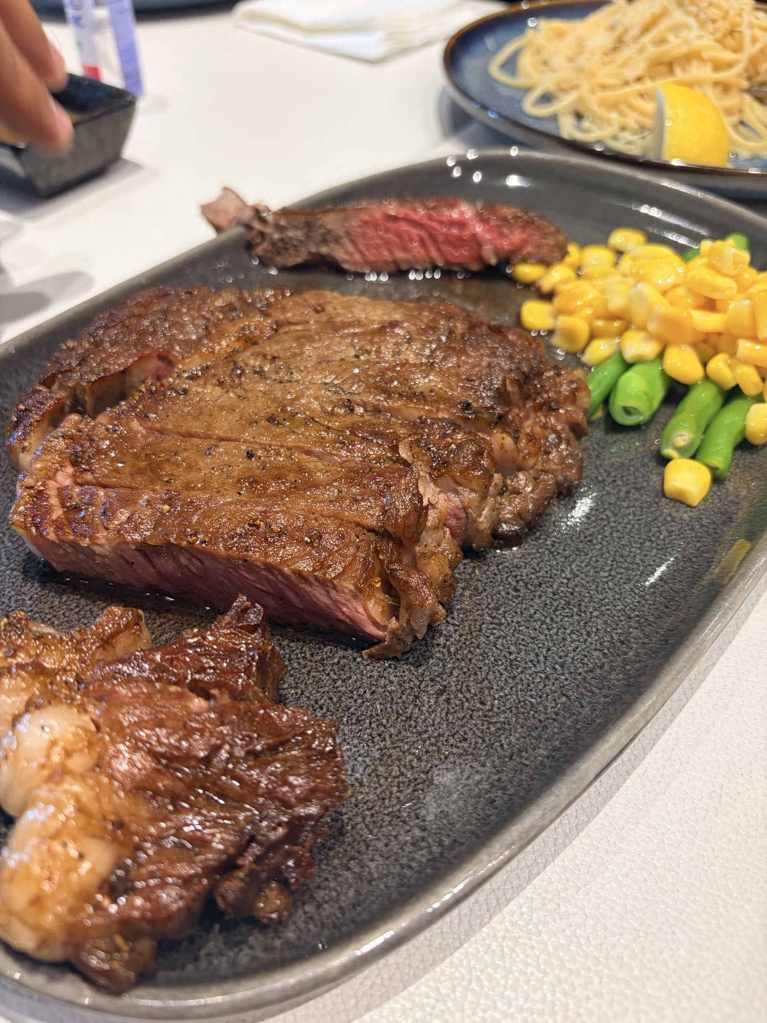 Steak with corn and beans