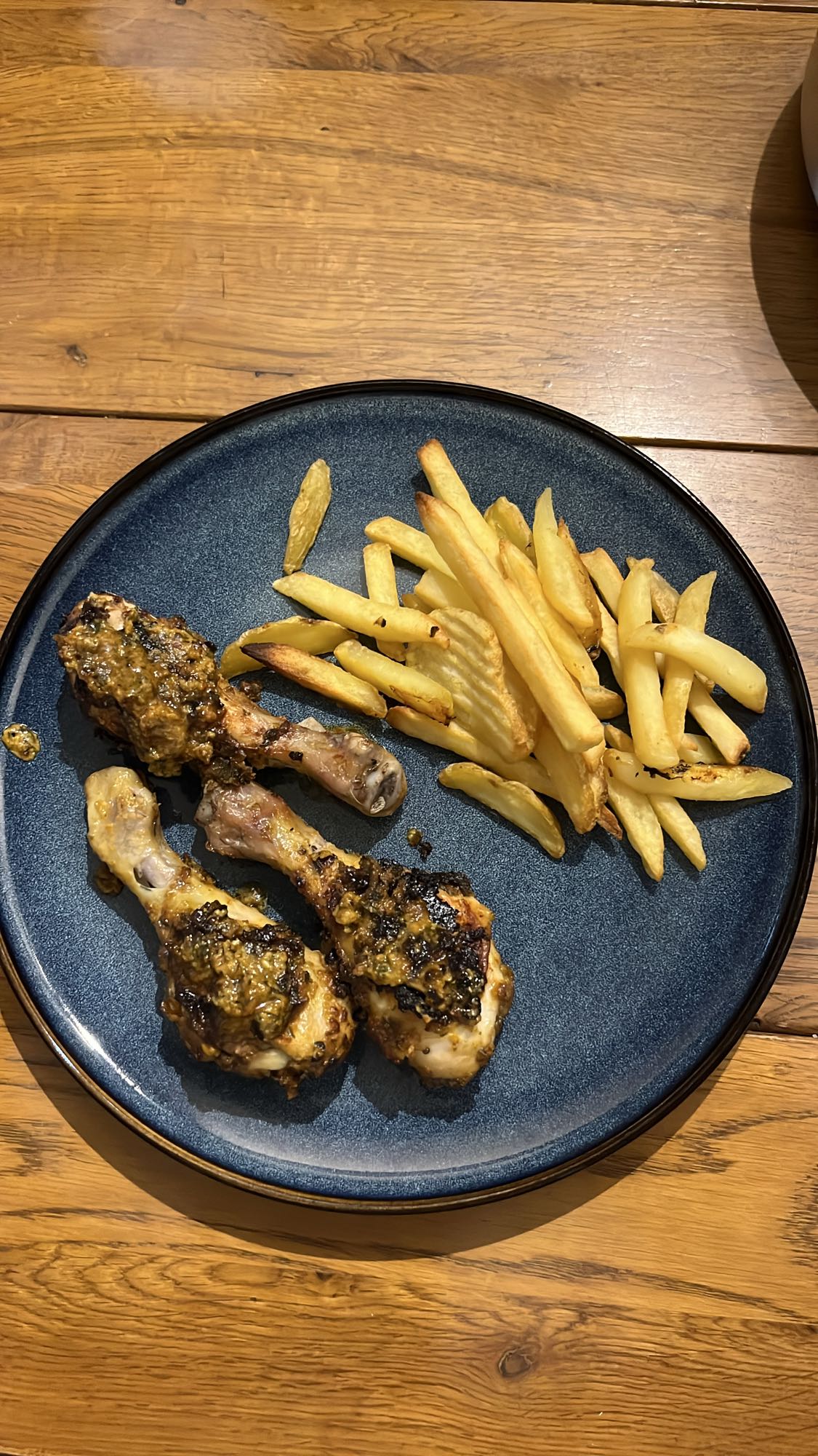 Chicken drumsticks and fries
