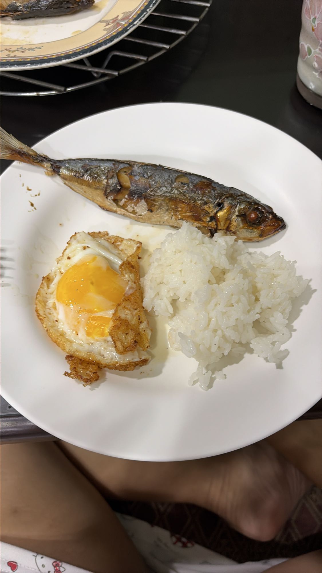 Fried fish, egg, rice