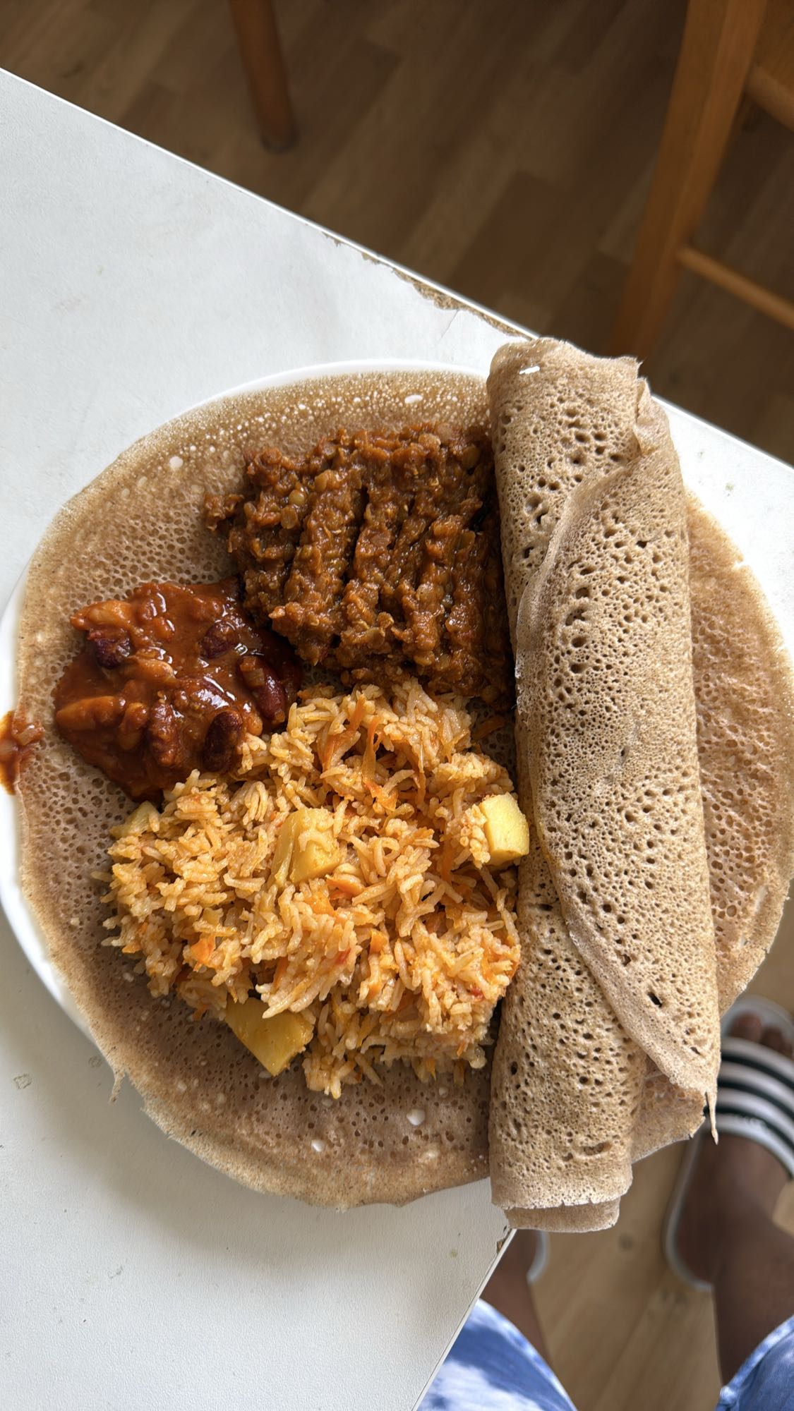 Injera with rice and stew