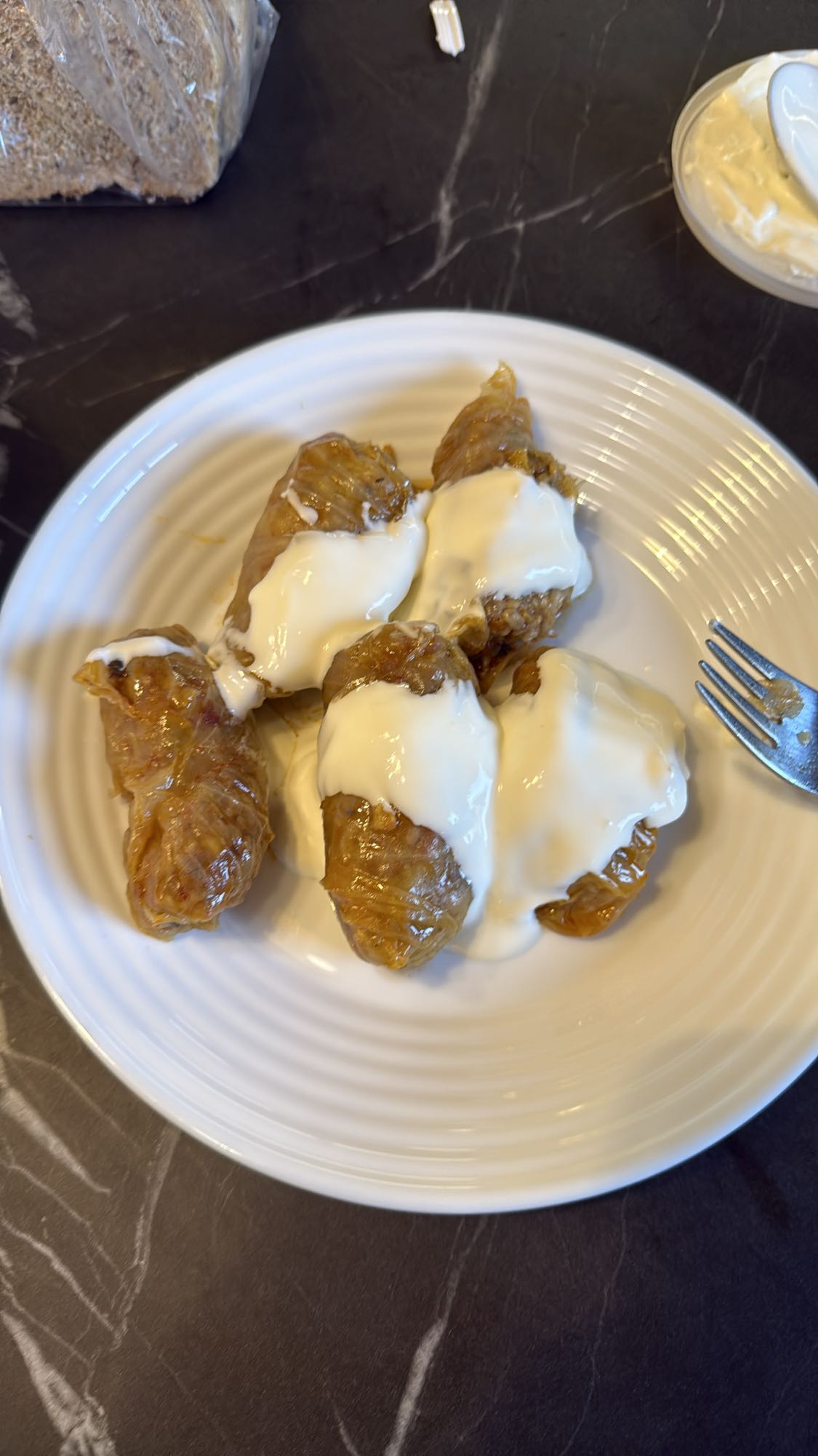 Stuffed cabbage rolls with yogurt