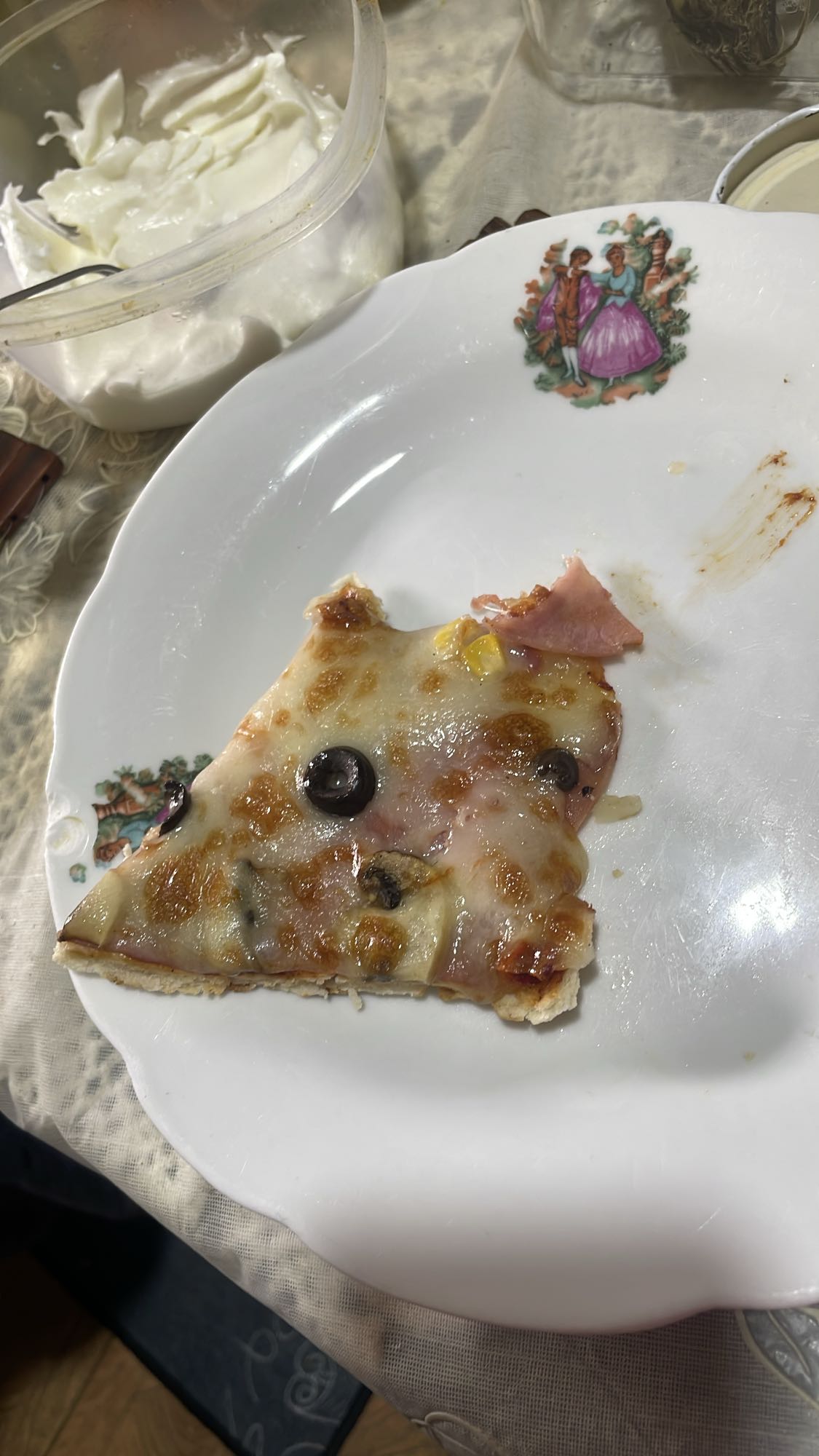 Pizza slice with yogurt