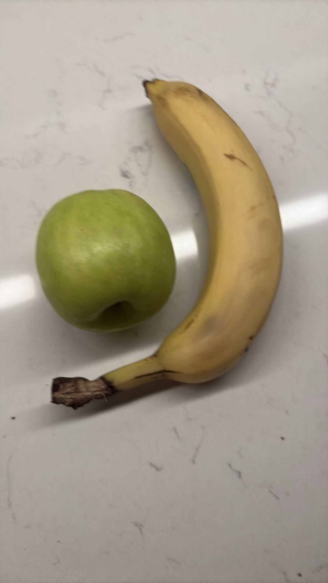 Grönt äpple och banan