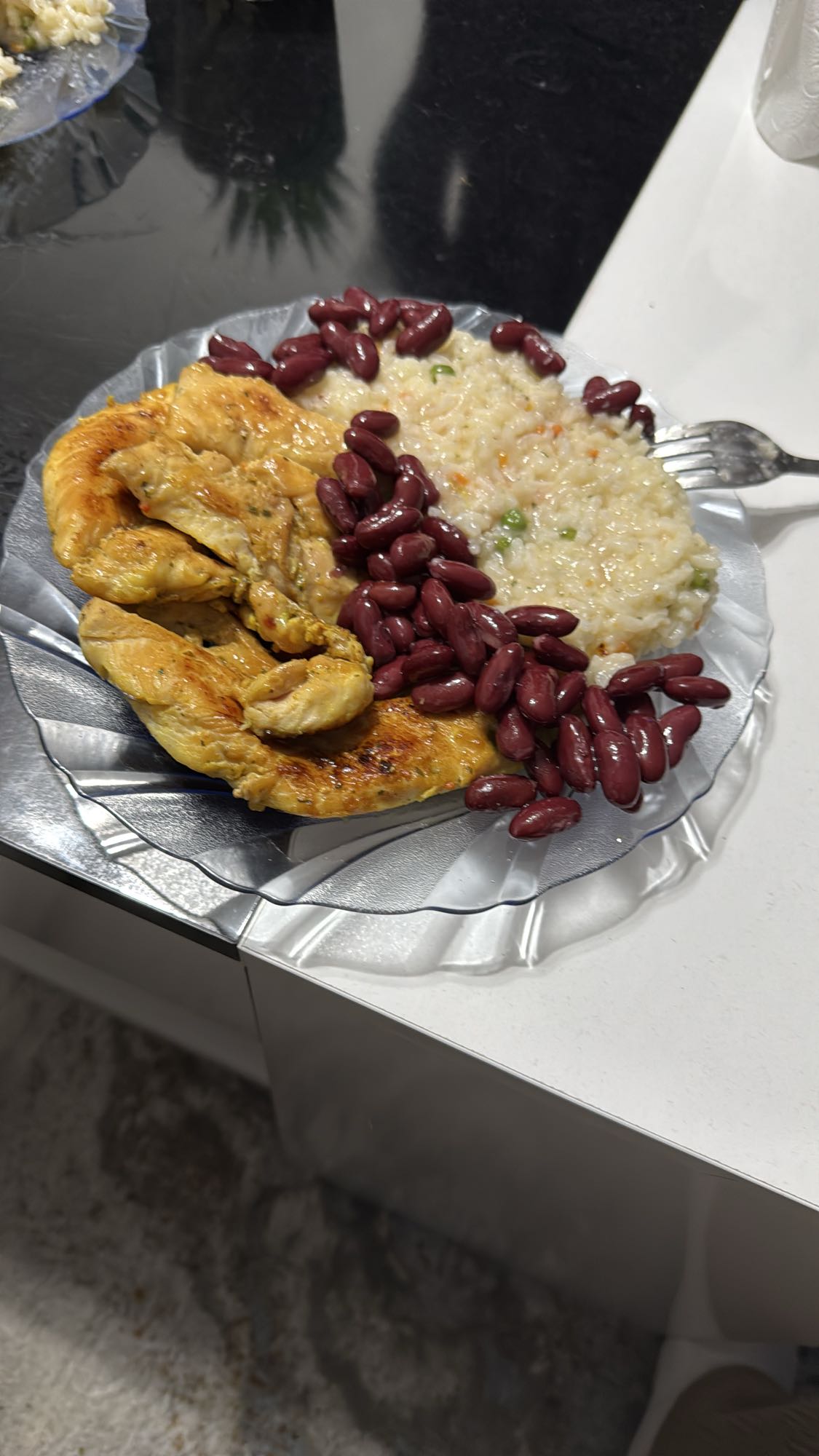 Chicken, rice and beans plate