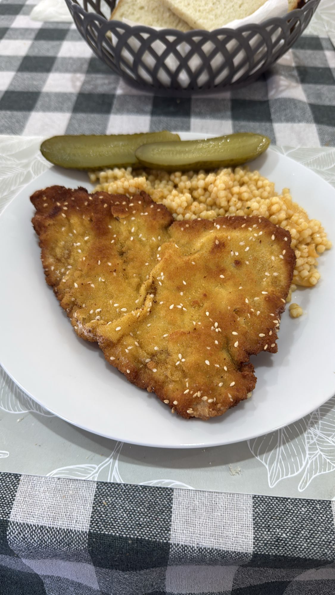 Breaded schnitzel with pasta