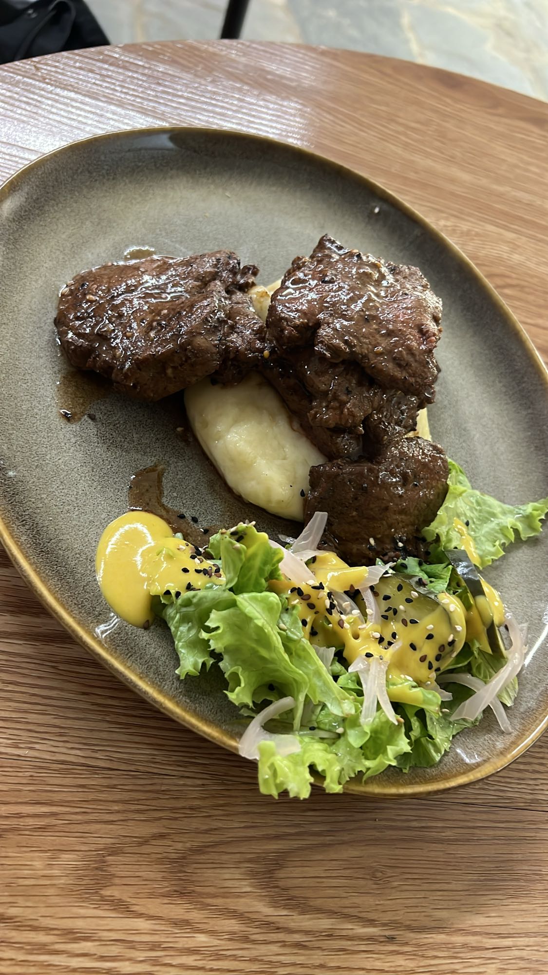 Steak with mash and salad