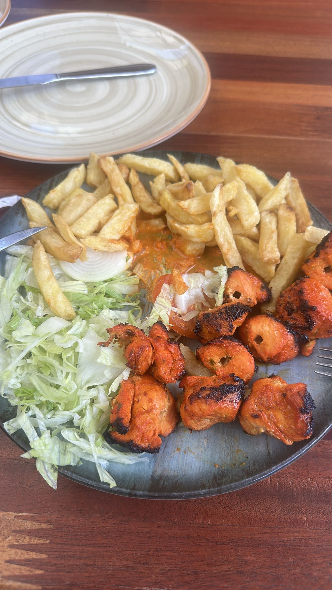 Chicken tikka with fries