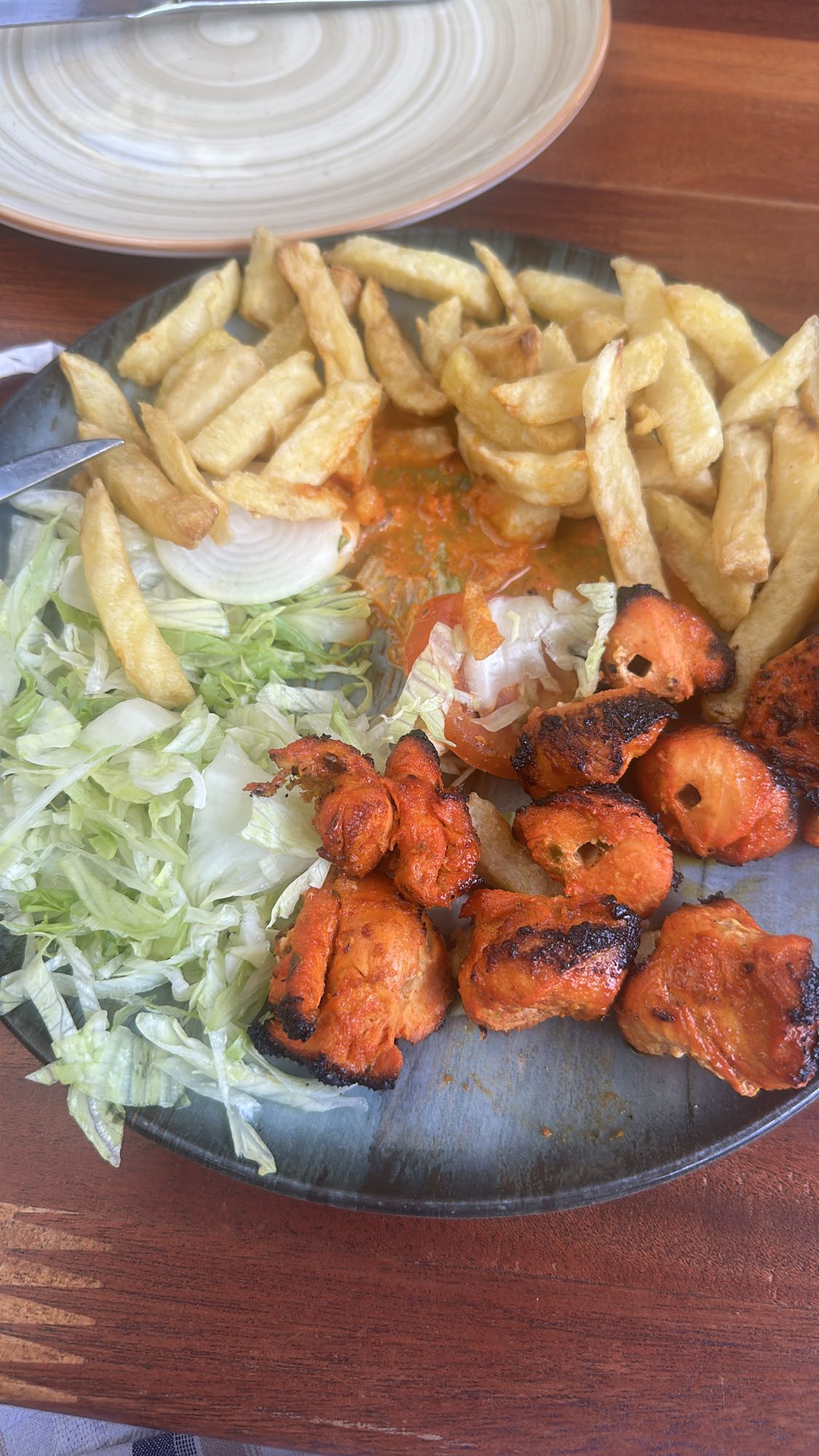 Chicken tikka with fries