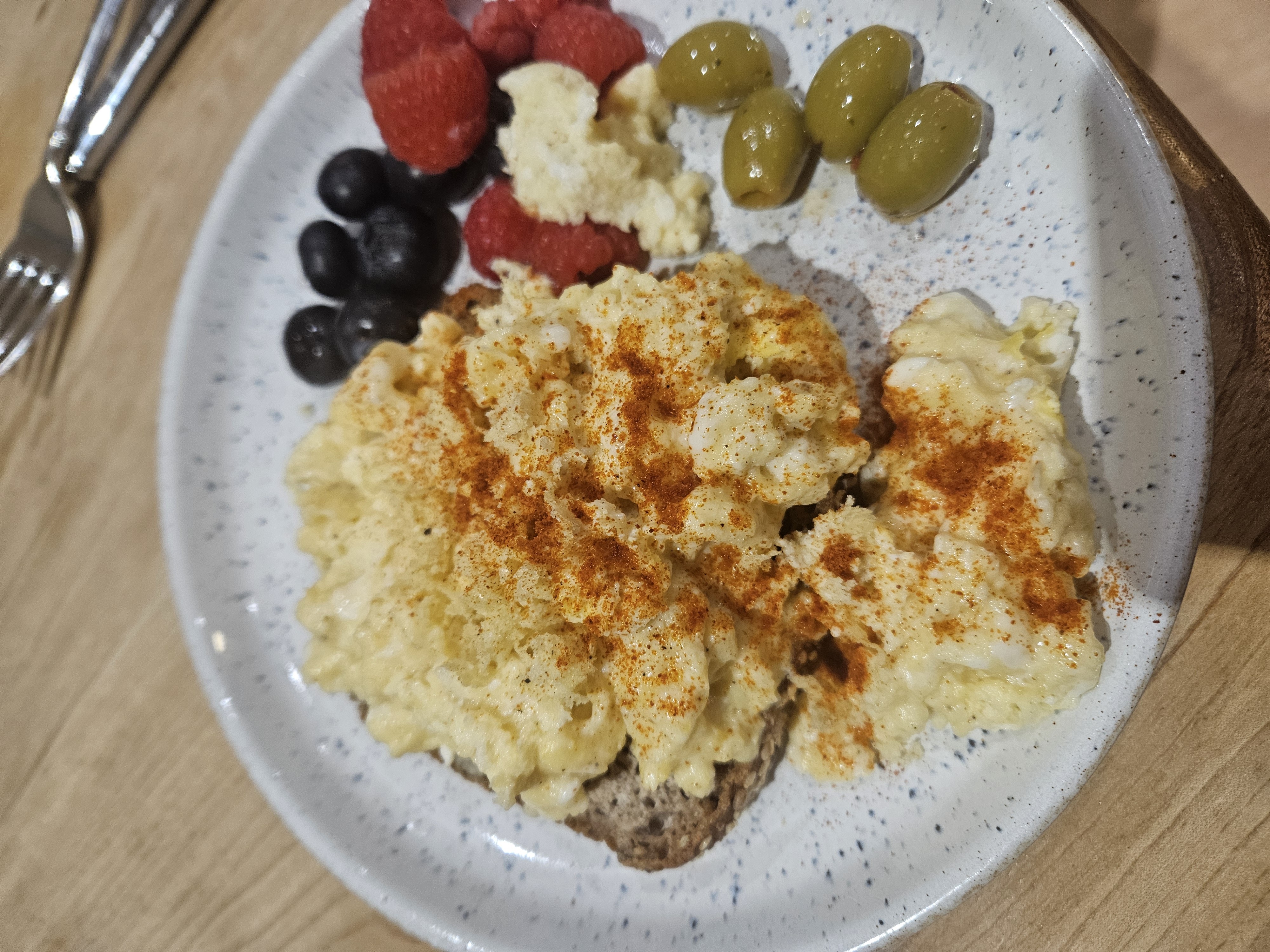 Scrambled eggs & berries plate