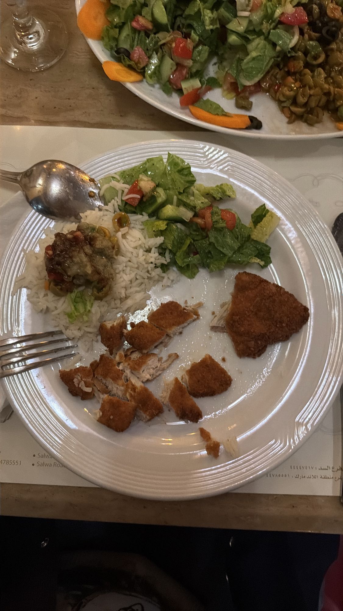 Breaded chicken with rice salad