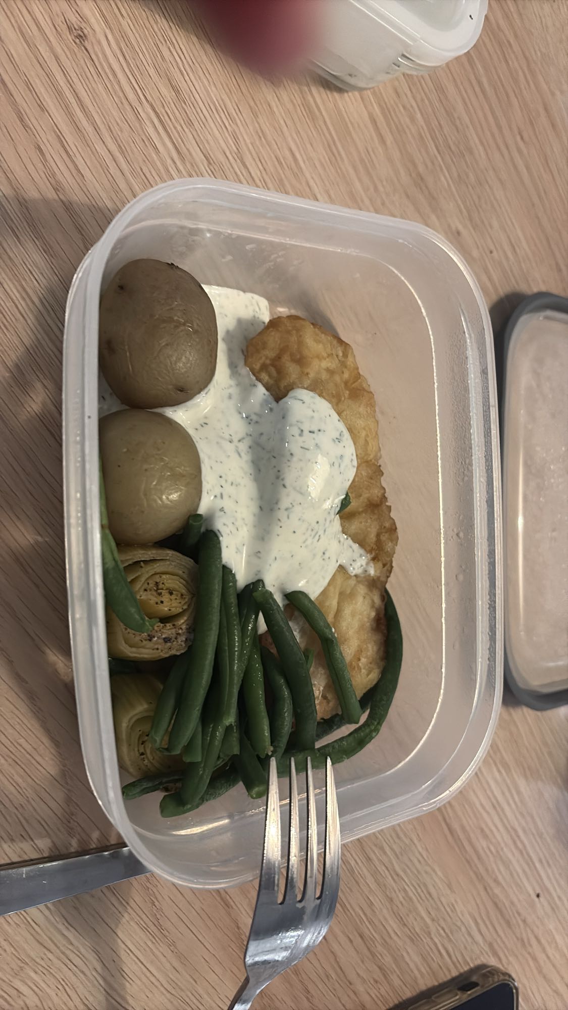 Panerad fisk med grönsaker