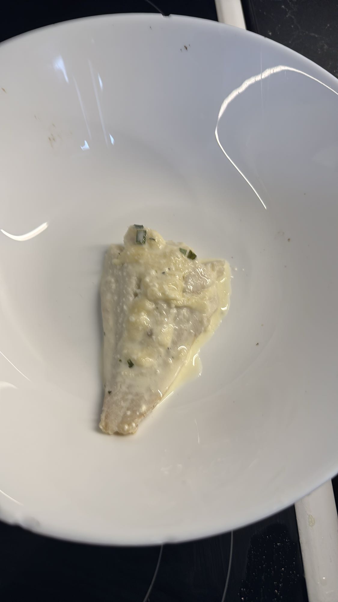 Vit fisk i gräddsås