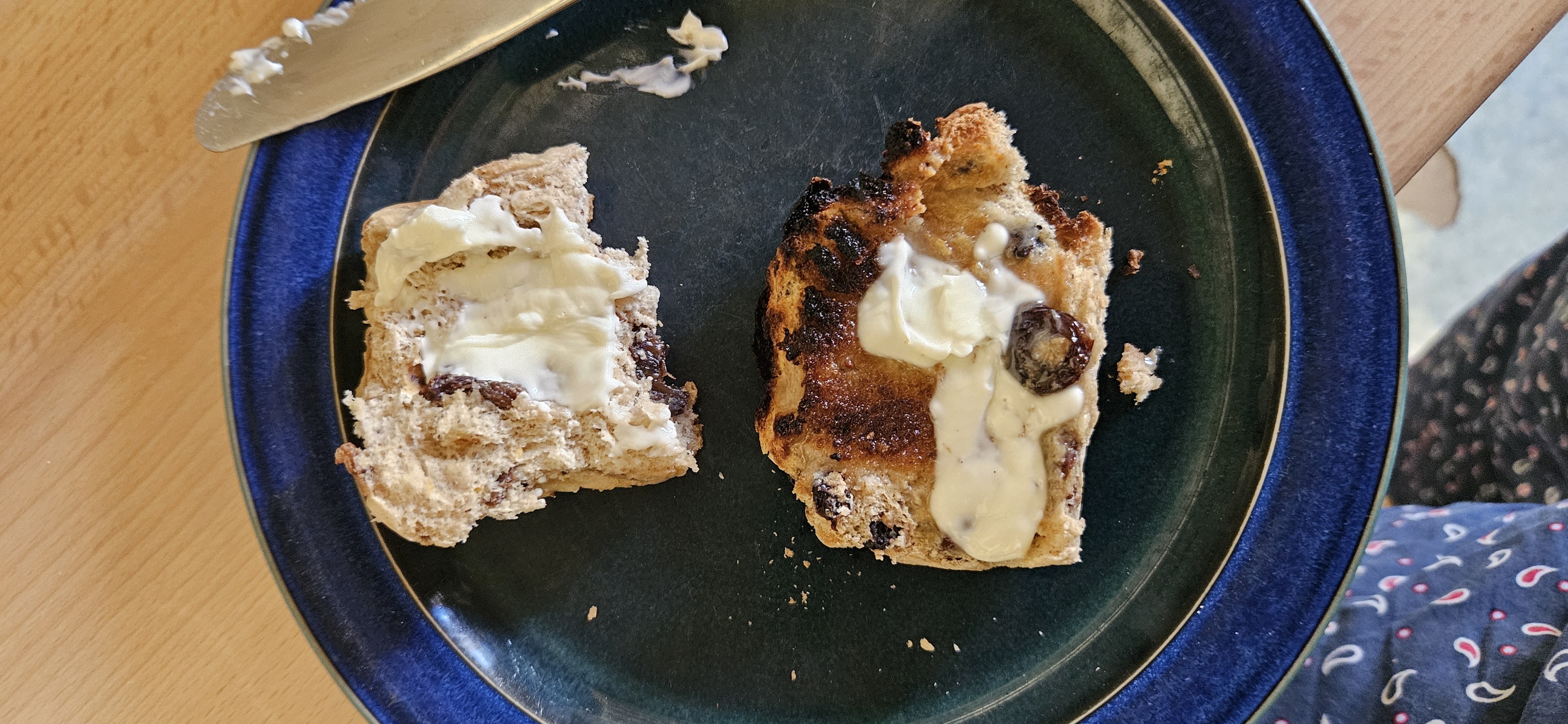 Raisin bun with butter