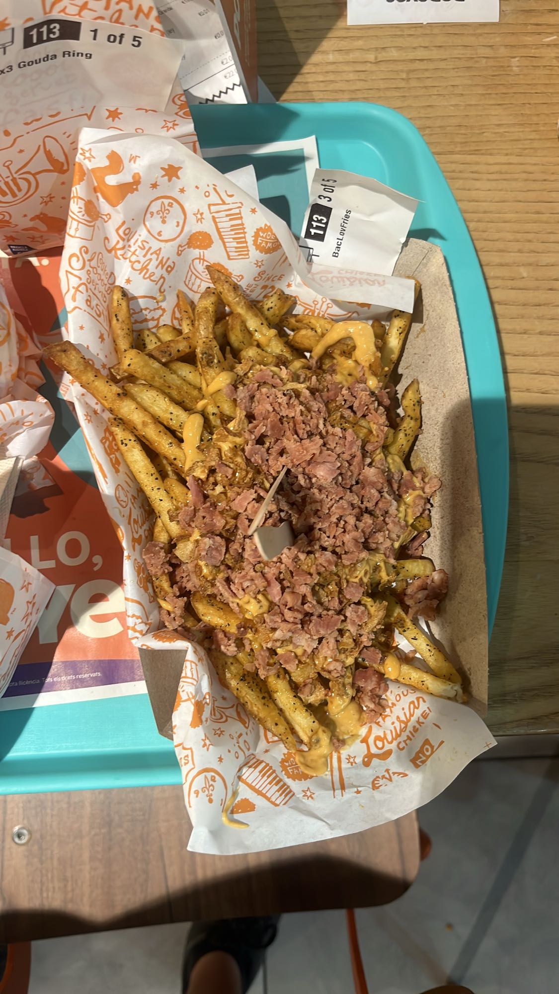 papas fritas con bacon
