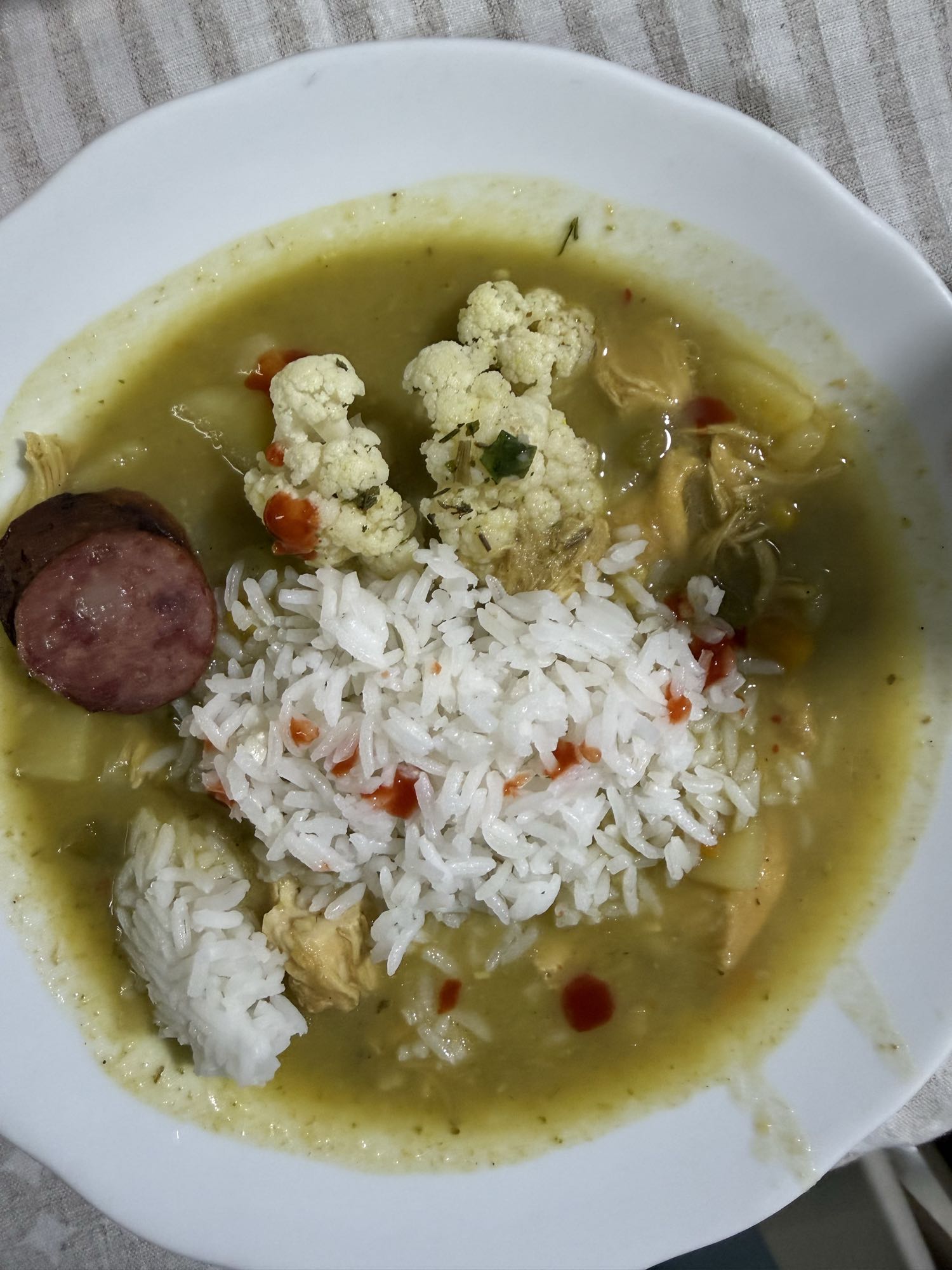 Canja com arroz e linguiça
