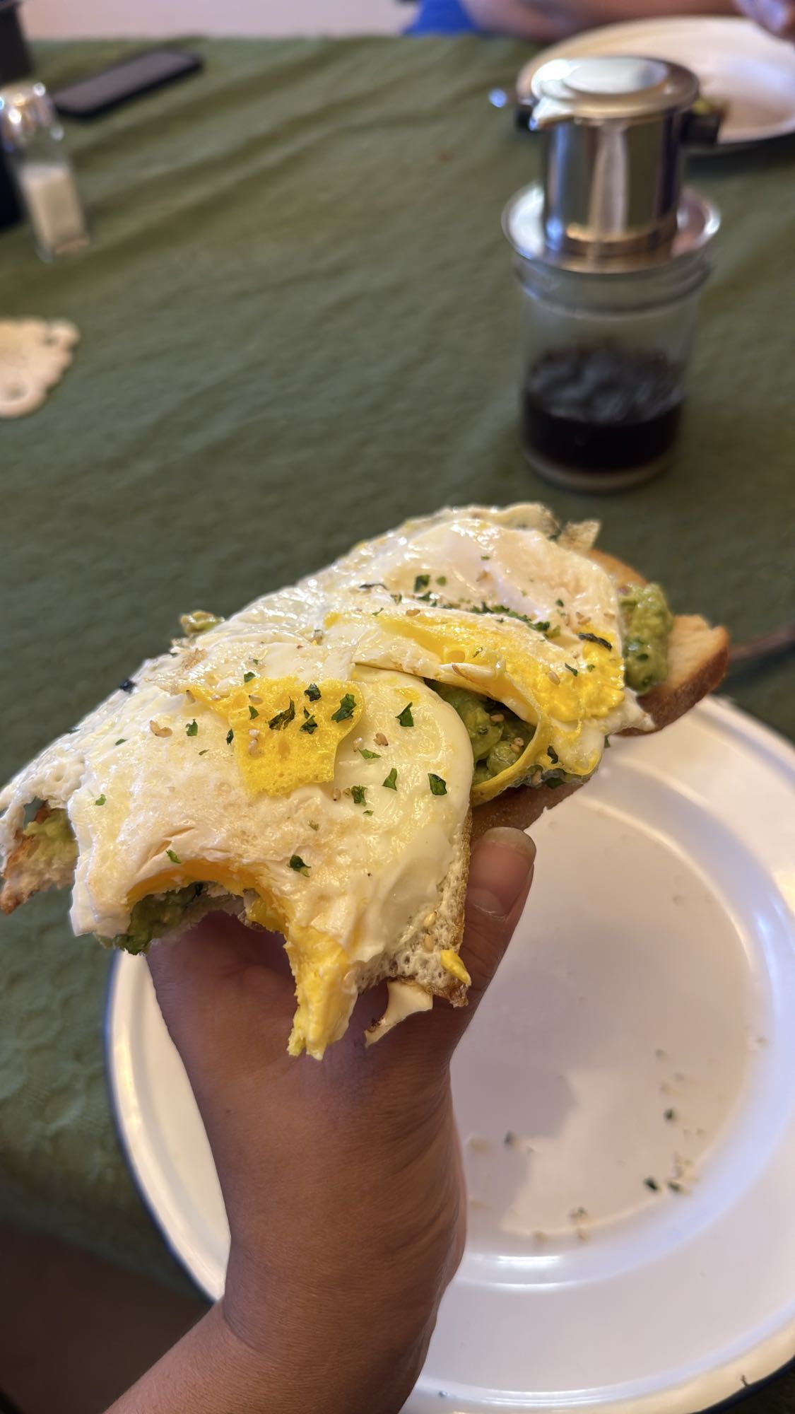 Sourdough Toast with Guacamole and Two Fried Eggs