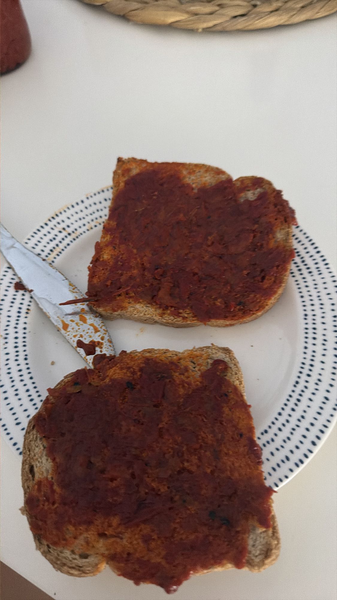 Two Wheat Breads with Tomato Sauce and Four Eggs