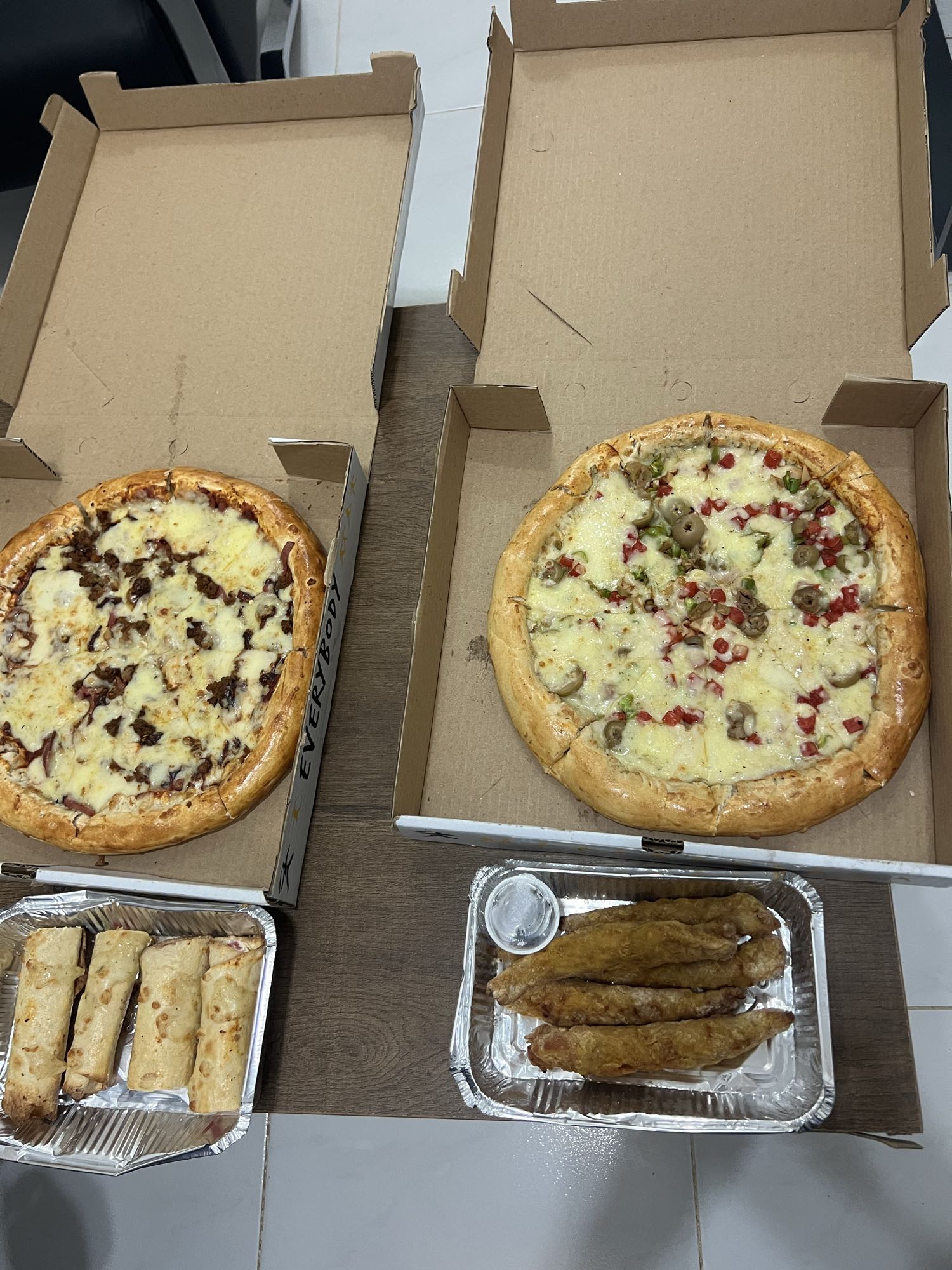 Vegetable Pizza with Cheese Rolls and Chicken Strip