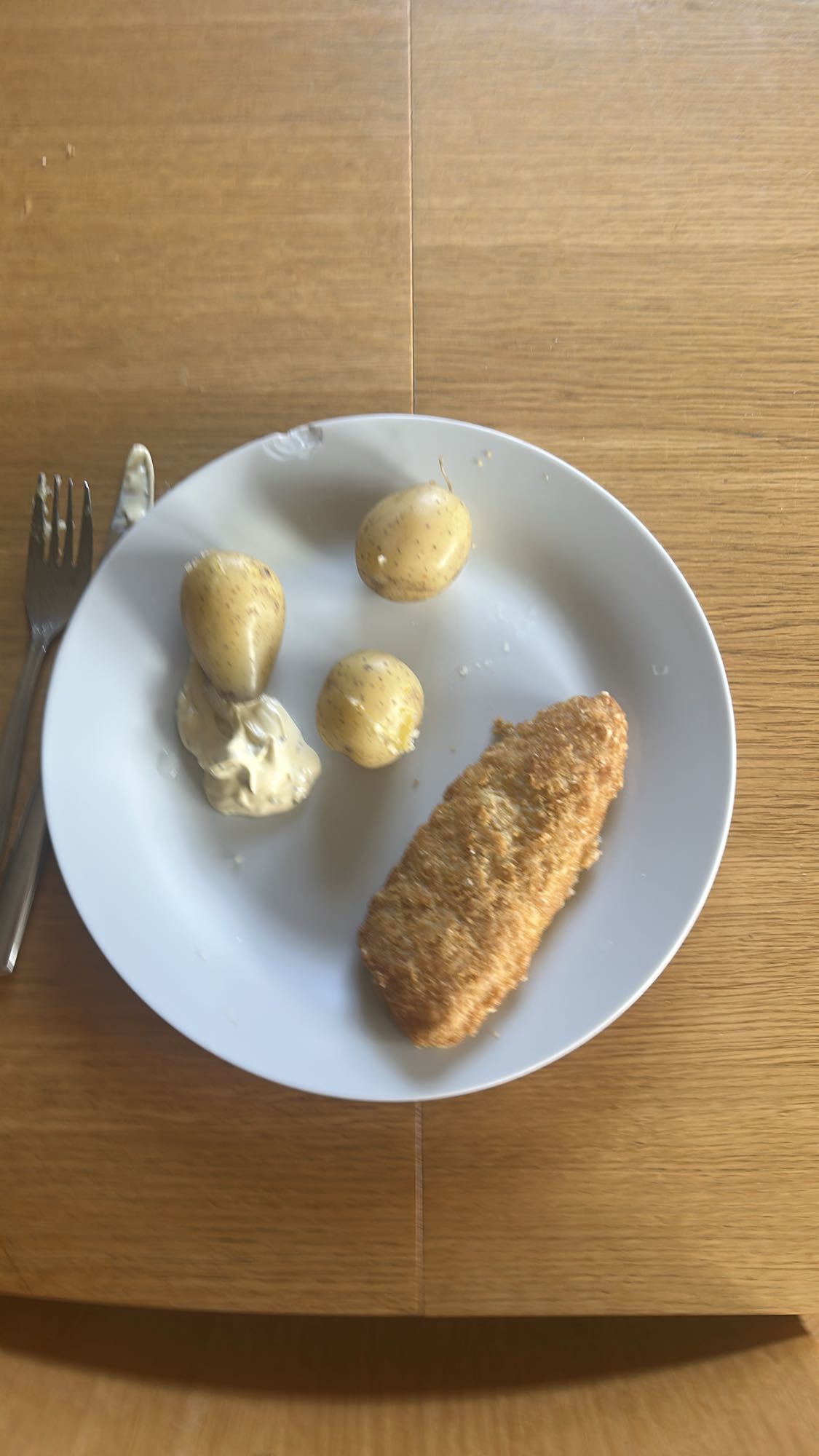 Panerad fisk med potatis