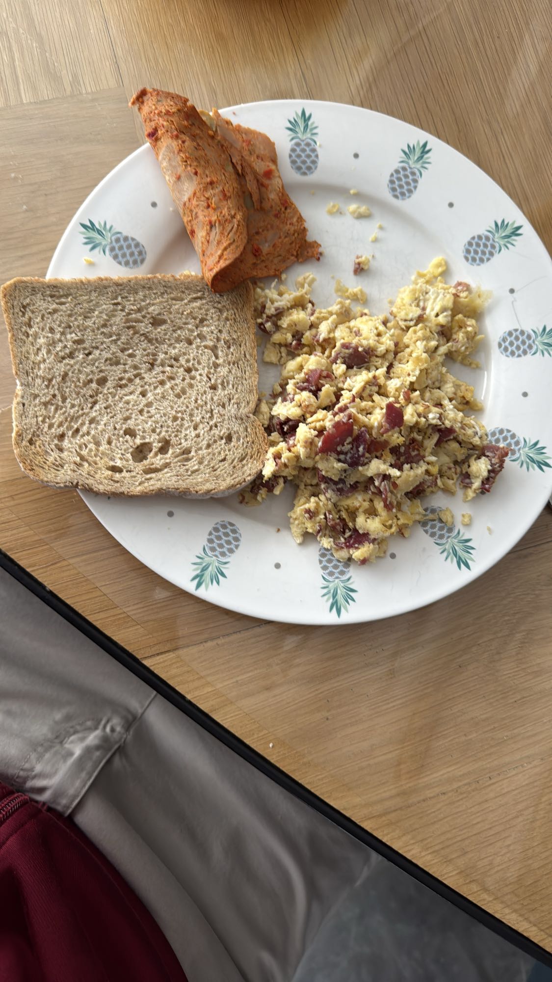 Scrambled Eggs with Pastrami, Spicy Chicken Salami and Two Brown Toasts