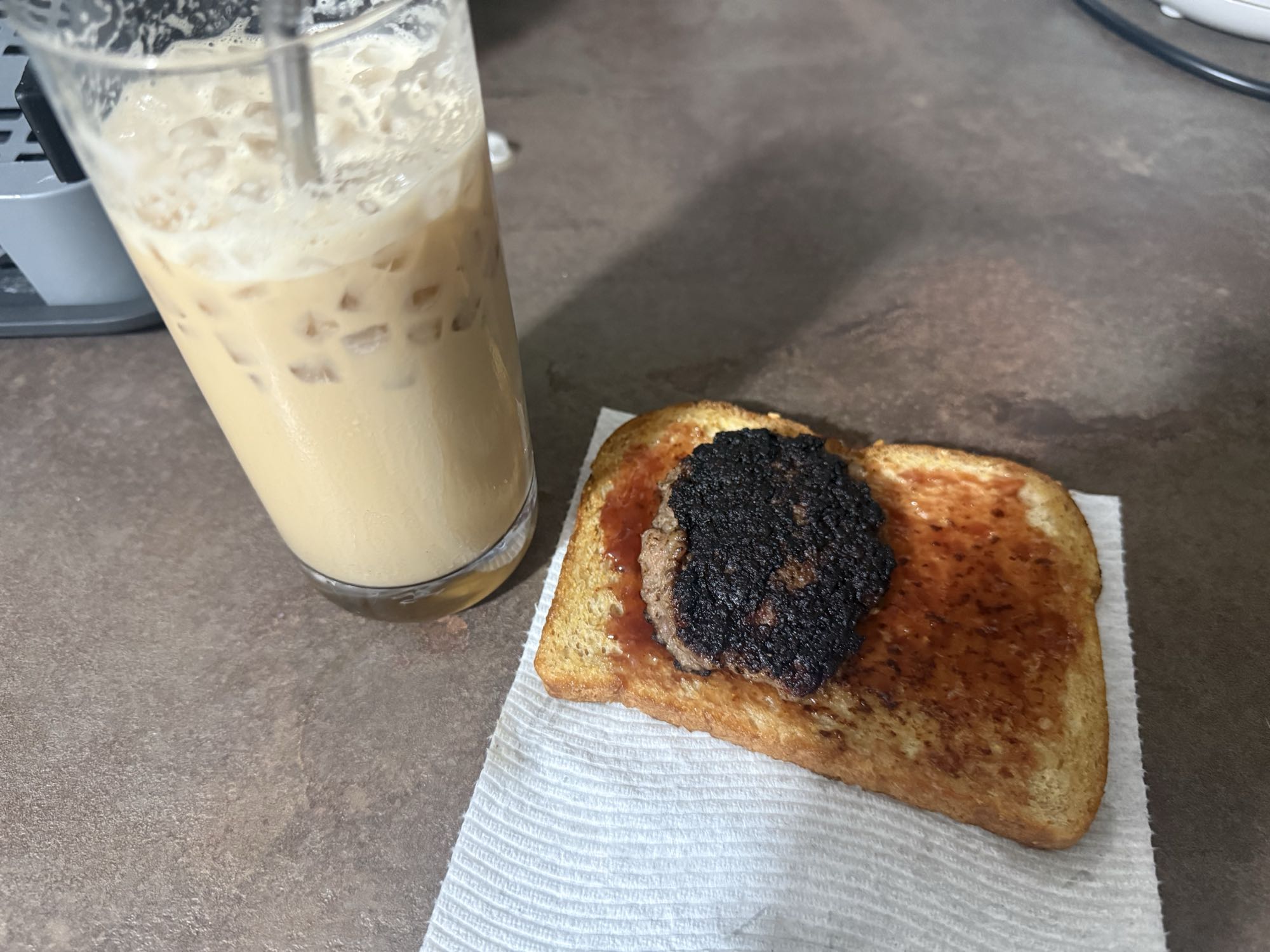 Multigrain Toast with Breakfast Sausage and Iced Double Latte