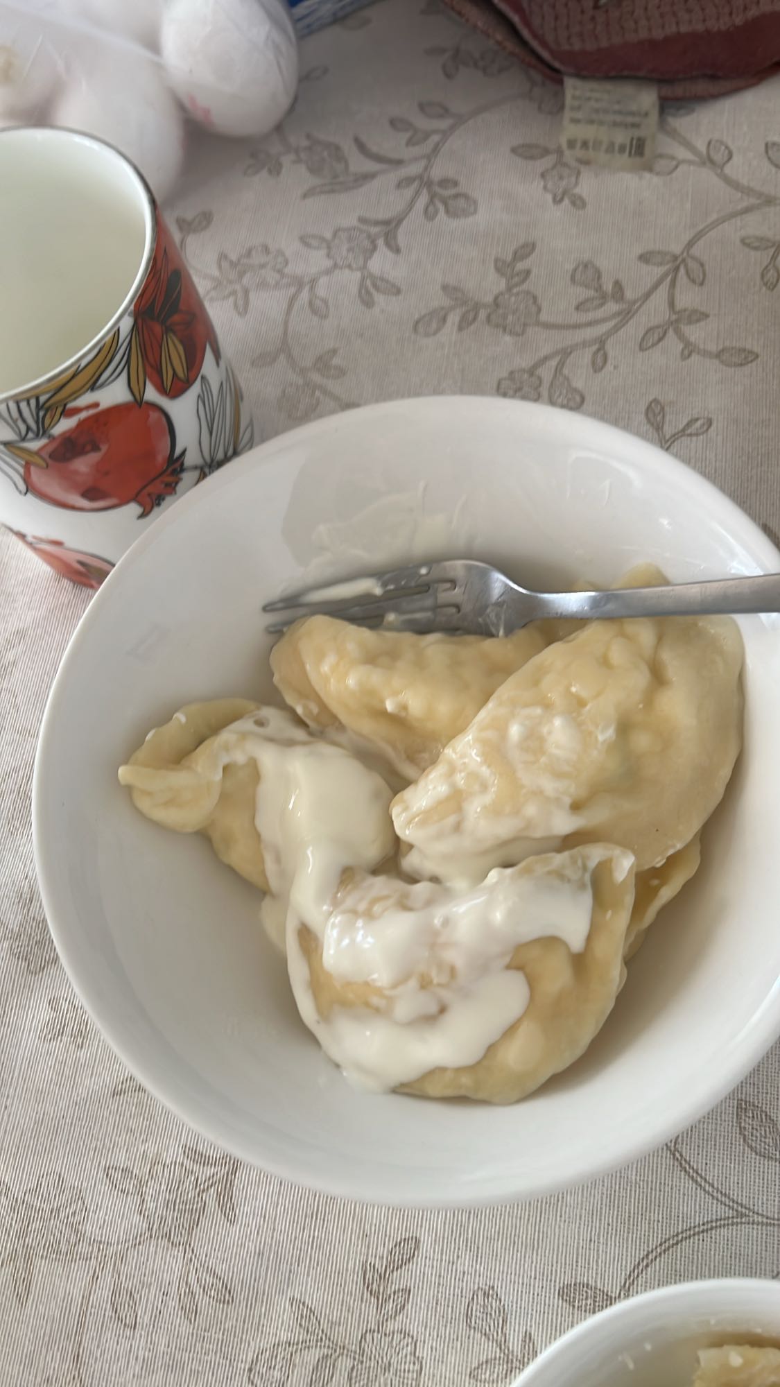 Вареники со сметаной